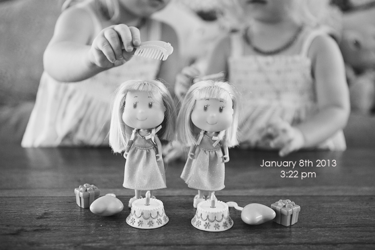 2 little dolls belong to two little girls brisbane baby photographer